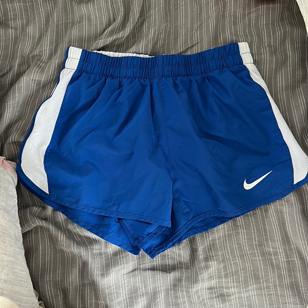 Blue and white Nike running shorts, size small, good condition